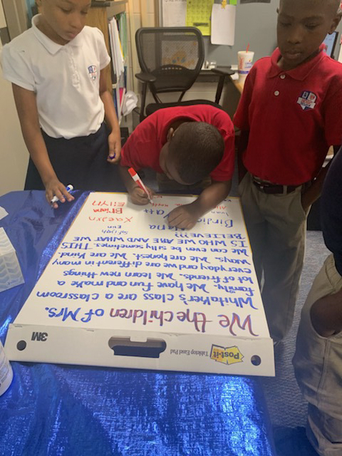 Students signing there class declaration 